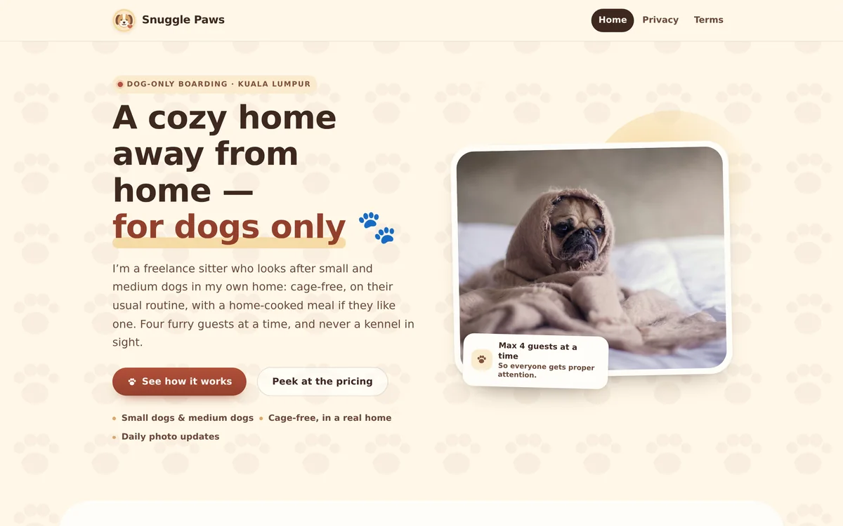 Snuggle Paws dog-boarding home page with a dog wrapped in a blanket.